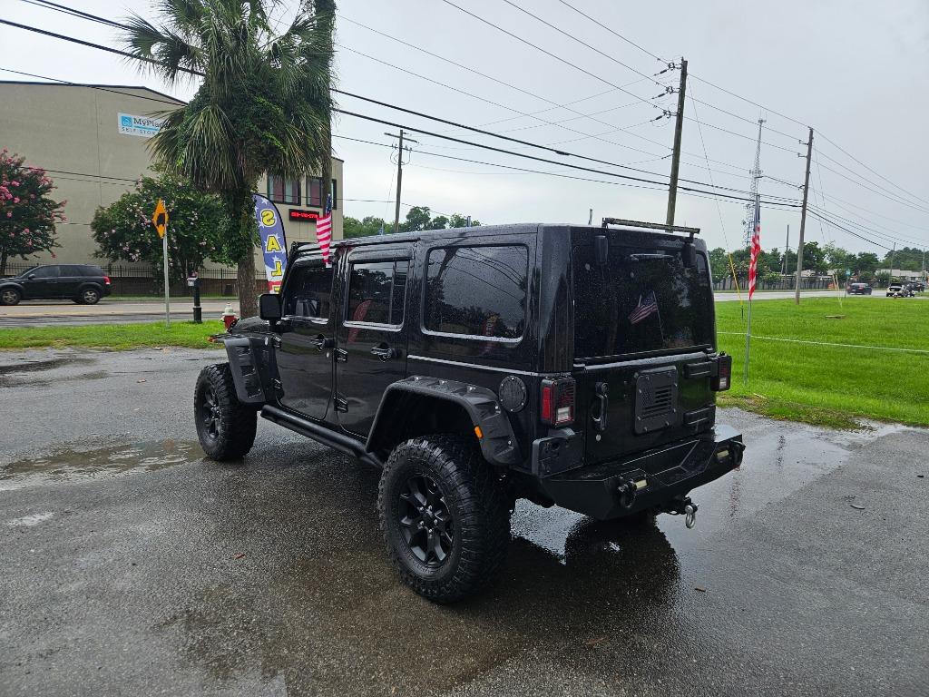 2013 Jeep Wrangler Unlimited Sahara - Photo 6